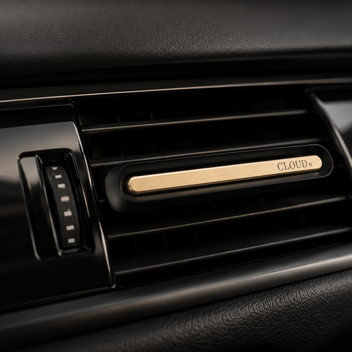 CLOUDe Scent car fragrance diffuser clipped to car air vent, gold aluminum bar, luxury alternative to car air fresheners